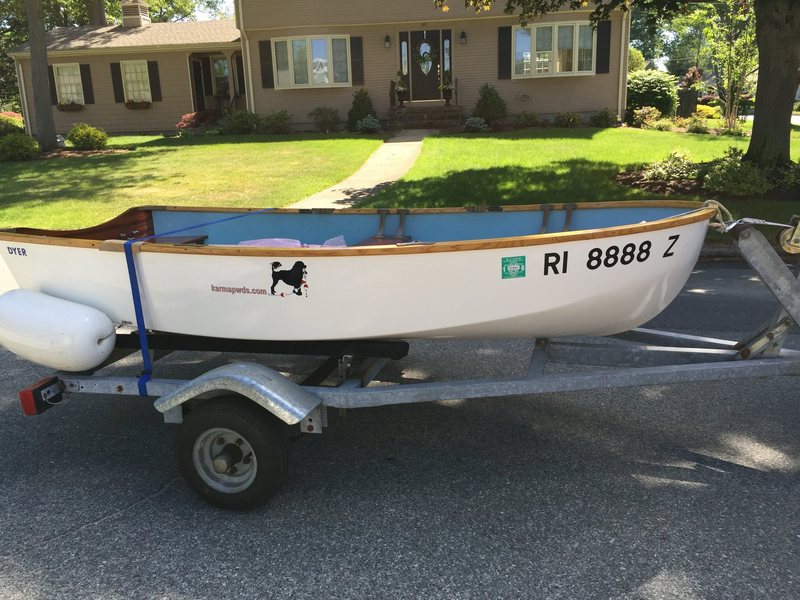 The Karma dinghy on its trailer, carrying the kennel&rsquo;s logo
